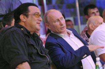Russian President Vladimir Putin (R) speaks with US actor Steven Seagal (L) during the Mixed fight Championship in the Russian Black Sea resort of Sochi on August 11, 2012.  AFP PHOTO / RIA-NOVOSTI / ALEKSEY NIKOLSKYI        (Photo credit should read ALEKSEY NIKOLSKYI/AFP/GettyImages)